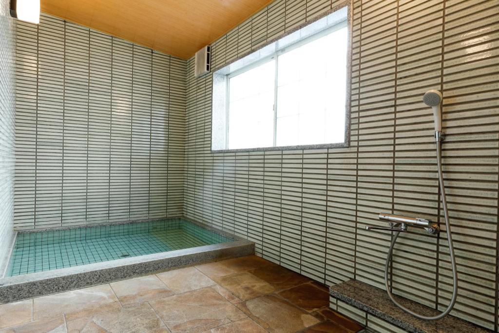 Fotografie z fotogalerie ubytování Tsuruya Ryokan v destinaci Toyooka