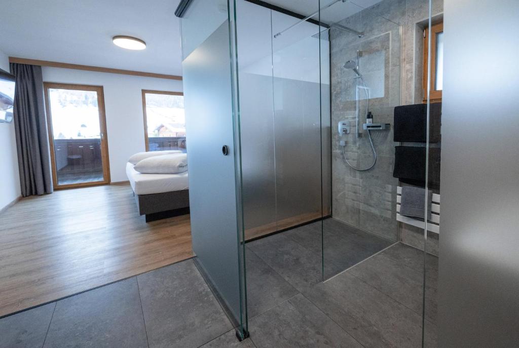 Postel nebo postele na pokoji v ubytování Hotel Steuxner
