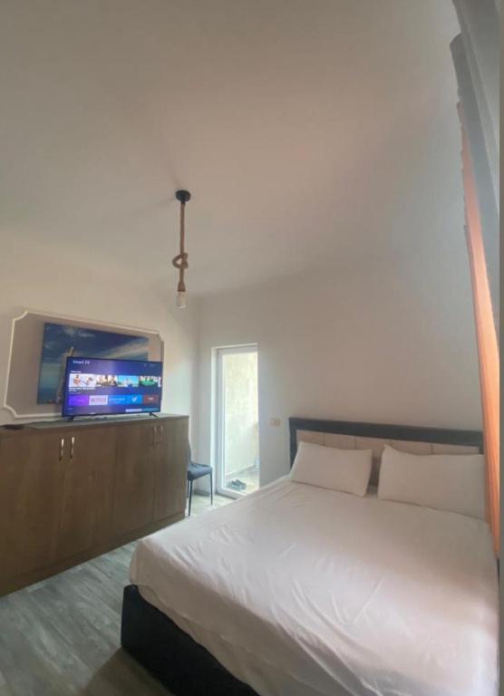 Rúm í herbergi á Daniels Homestay