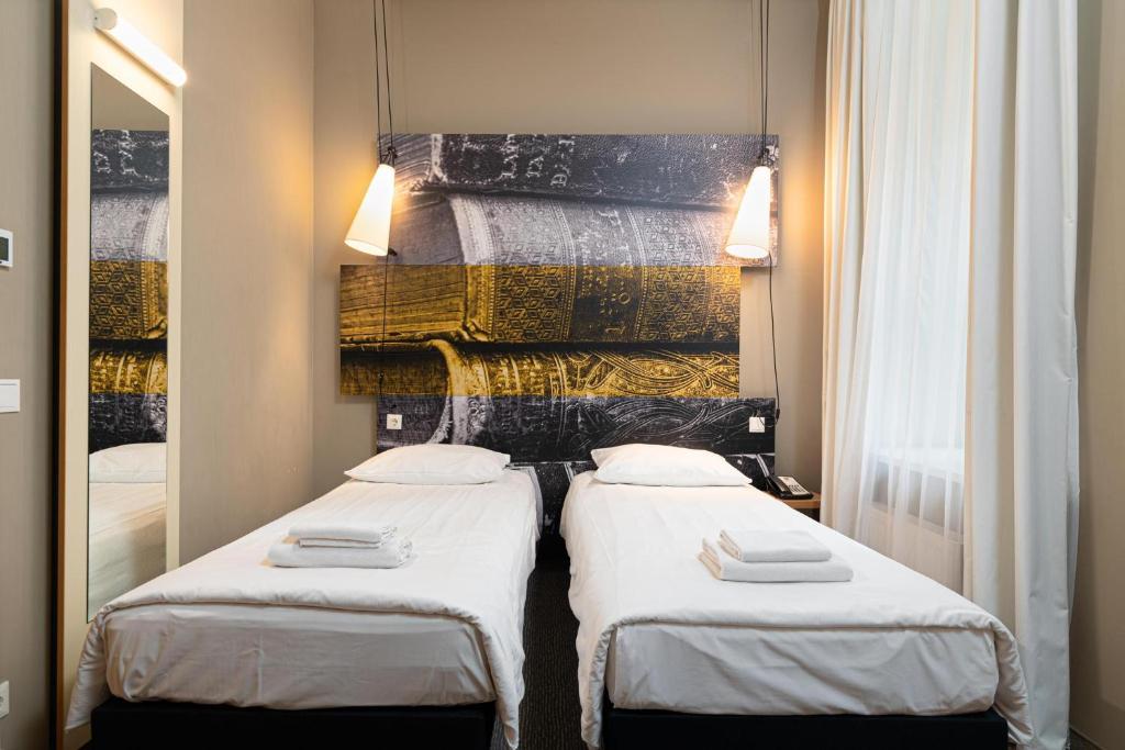 Postel nebo postele na pokoji v ubytování Ibis Riga Centre