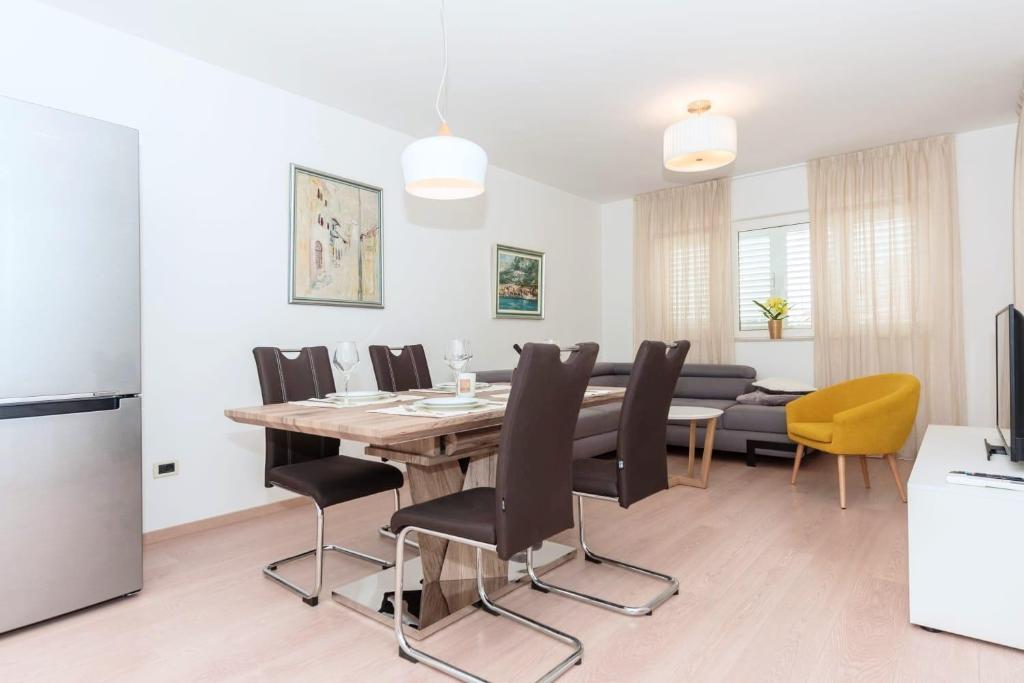 Televízia a/alebo spoločenská miestnosť v ubytovaní Apartment Vapore