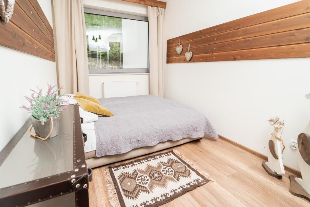 Postel nebo postele na pokoji v ubytování ApartView by Rent like home