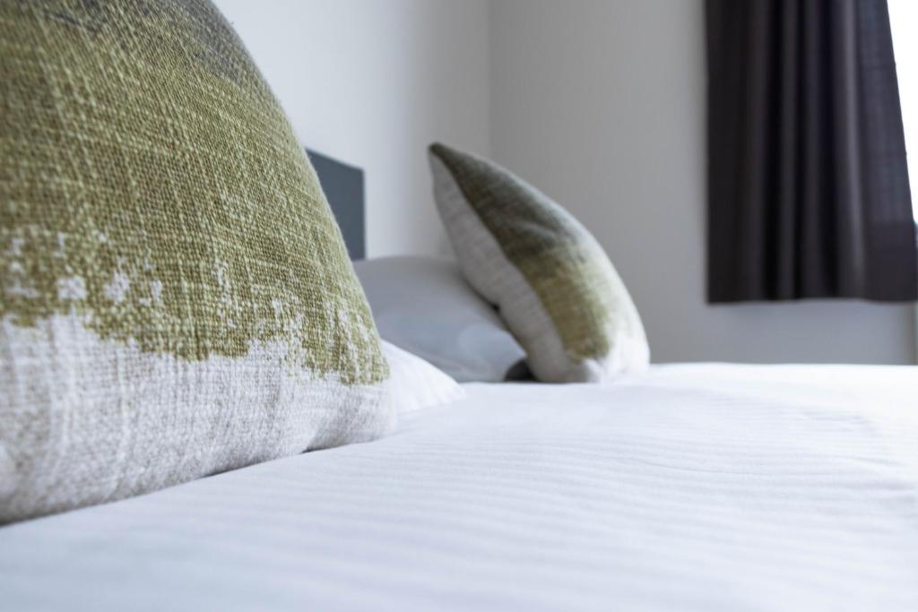 Postel nebo postele na pokoji v ubytování Comfortabel vakantie appartement aan zee - De Zandloper