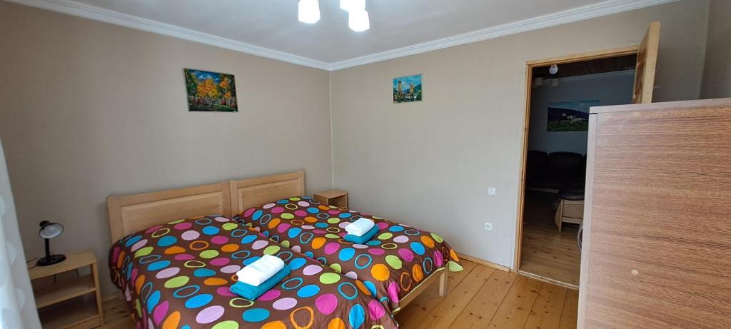 Postel nebo postele na pokoji v ubytování Guesthouse Robi