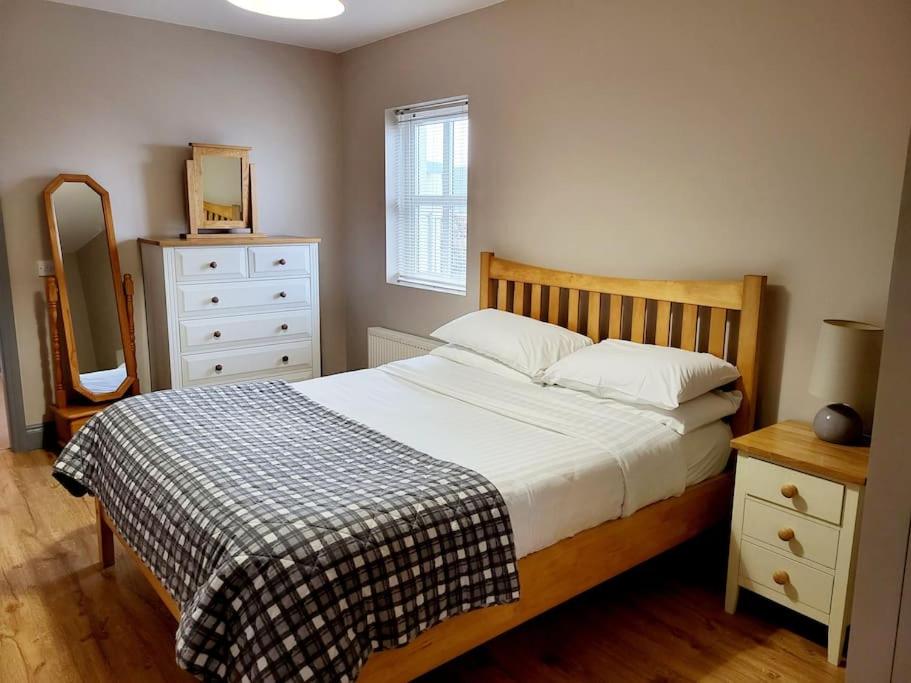 Postel nebo postele na pokoji v ubytování Clairhouse Accommodation