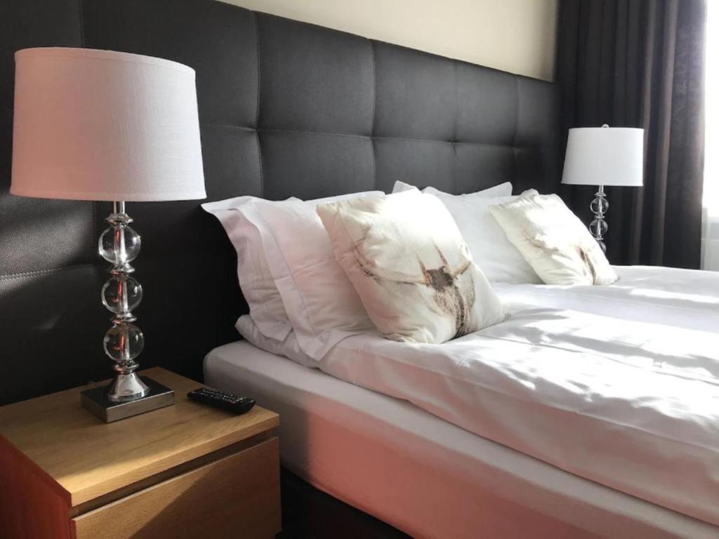 Postel nebo postele na pokoji v ubytování Snorri's Guesthouse