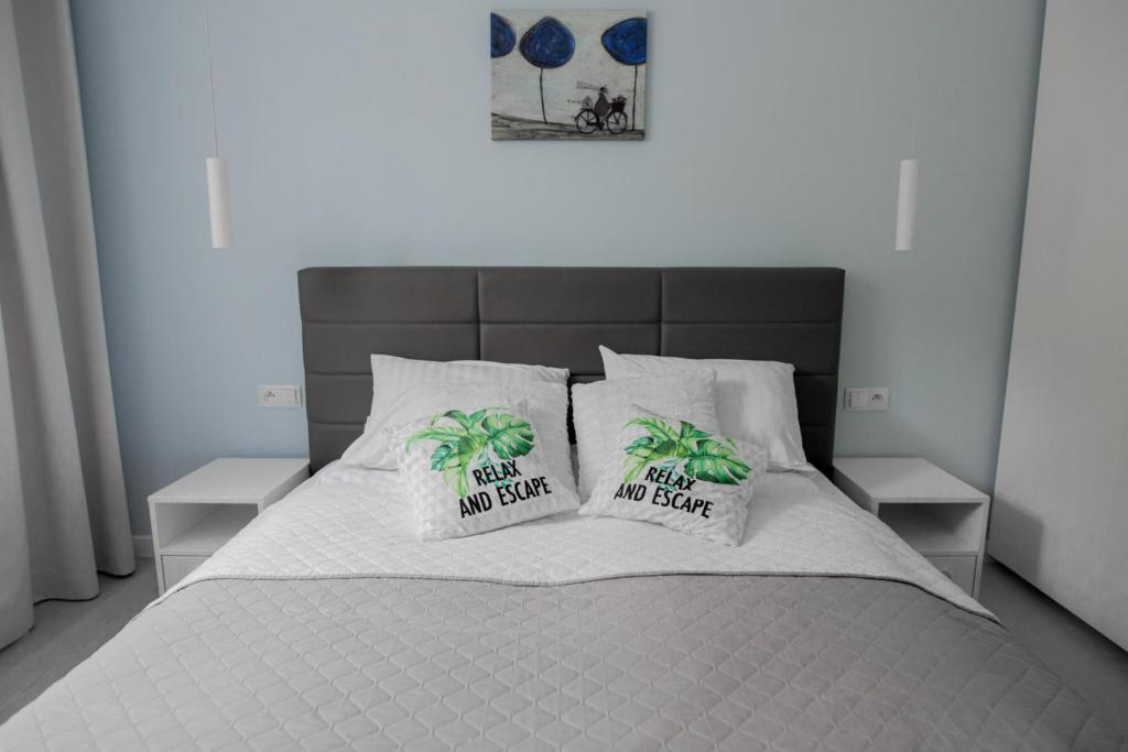 Postel nebo postele na pokoji v ubytování ApartView by Rent like home