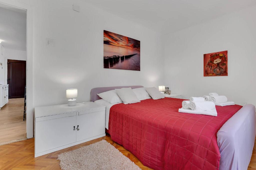 Posteľ alebo postele v izbe v ubytovaní City View Apartment