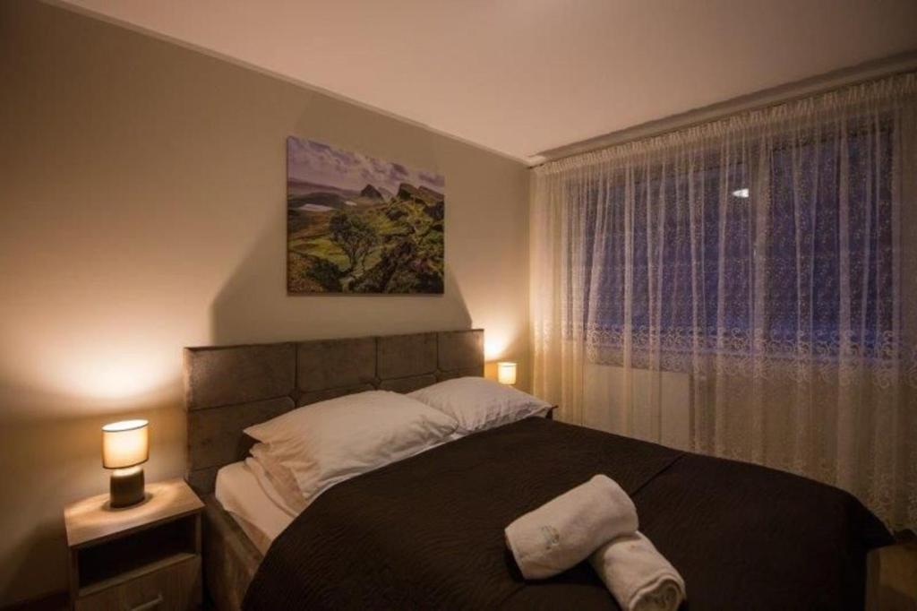 Postel nebo postele na pokoji v ubytování ApartView by Rent like home