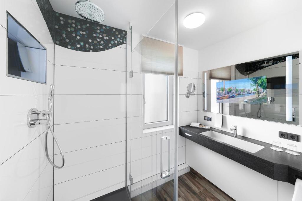 MASEVEN Stuttgart SI Centrum ehem SI-SUITES - Resim 25