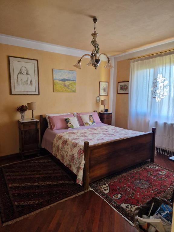 Postel nebo postele na pokoji v ubytování Casa Delle Coccole