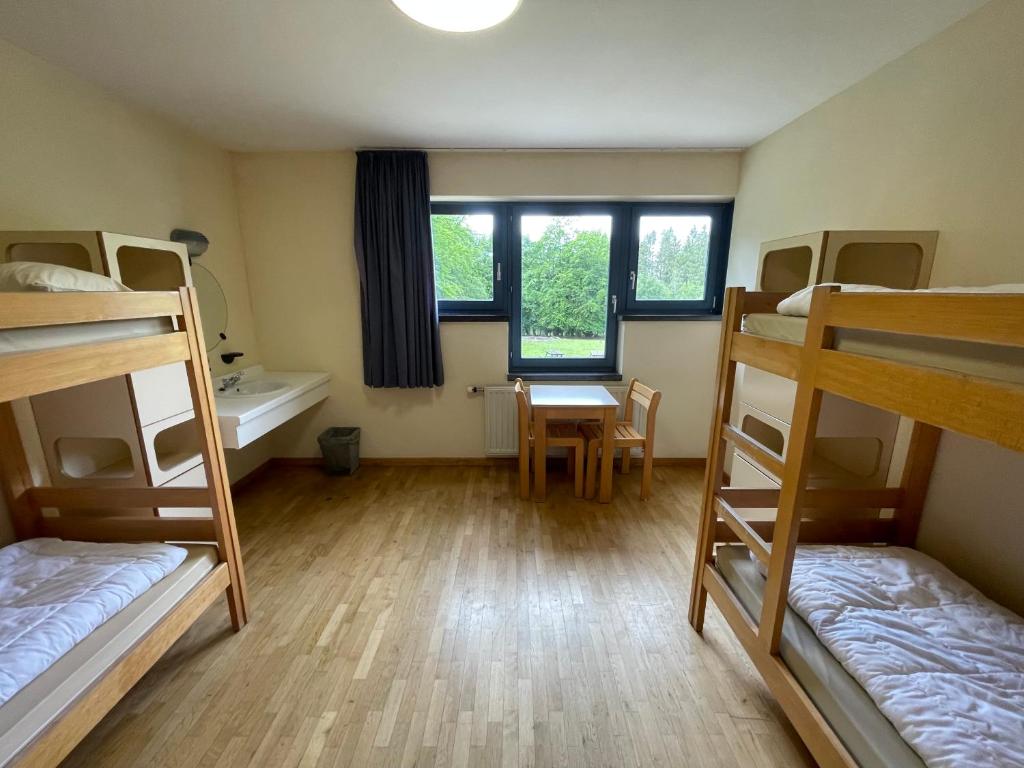 Postel nebo postele na pokoji v ubytování Gîte Kaleo Ovifat