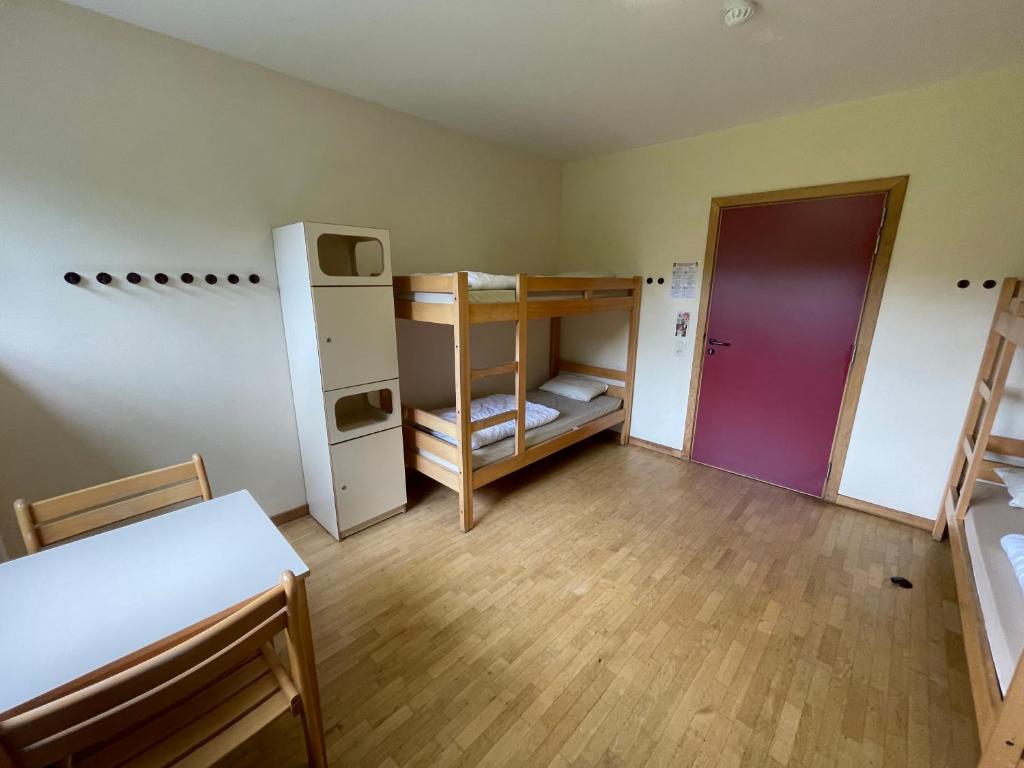 Postel nebo postele na pokoji v ubytování Gîte Kaleo Ovifat