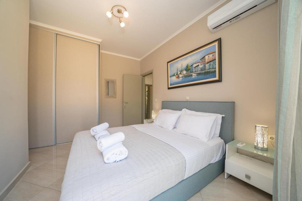 Posteľ alebo postele v izbe v ubytovaní Dendra Apartments at Skala