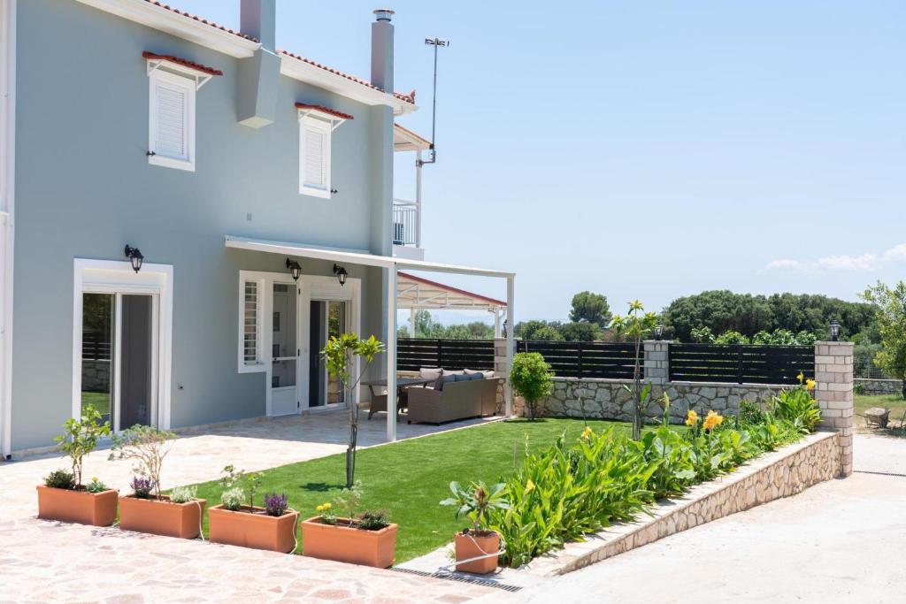 Vonkajšia záhrada v ubytovaní Dendra Apartments at Skala