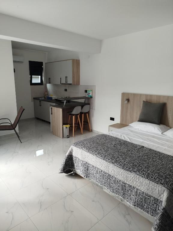 Postel nebo postele na pokoji v ubytování Apartman Vito