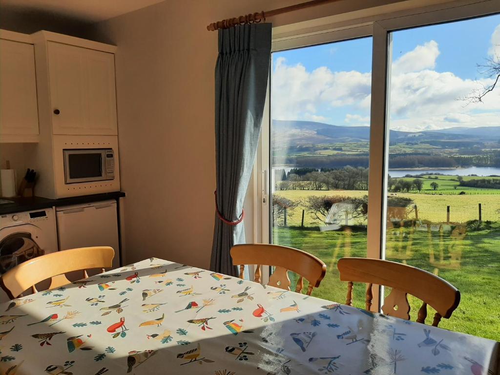 Kuchyň nebo kuchyňský kout v ubytování Abhainn Ri Cottages