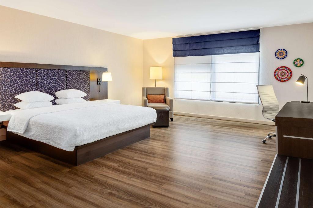 Hampton By Hilton San Jose Airport Costa Ricaにあるベッド