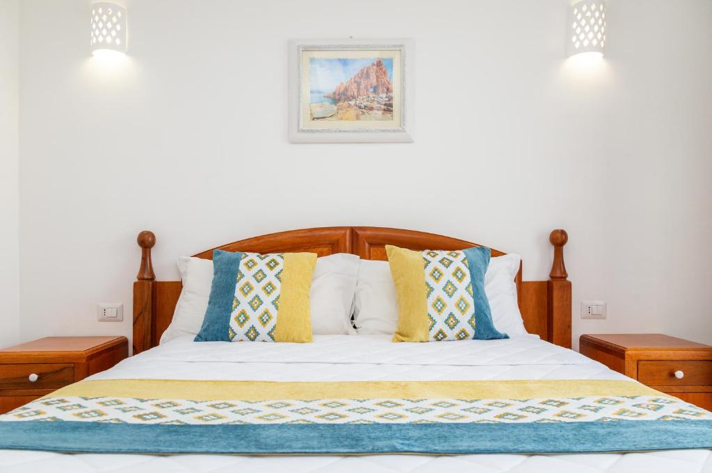 Кровать или кровати в номере Hotel Vecchia Marina