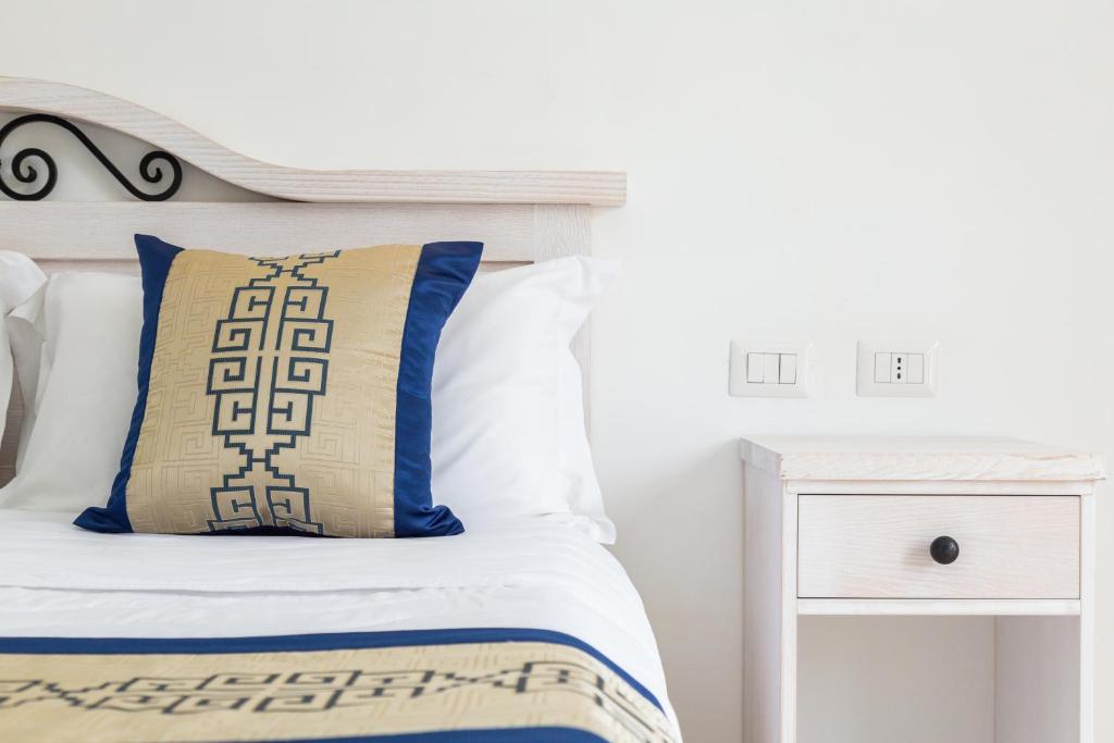 Кровать или кровати в номере Hotel Vecchia Marina