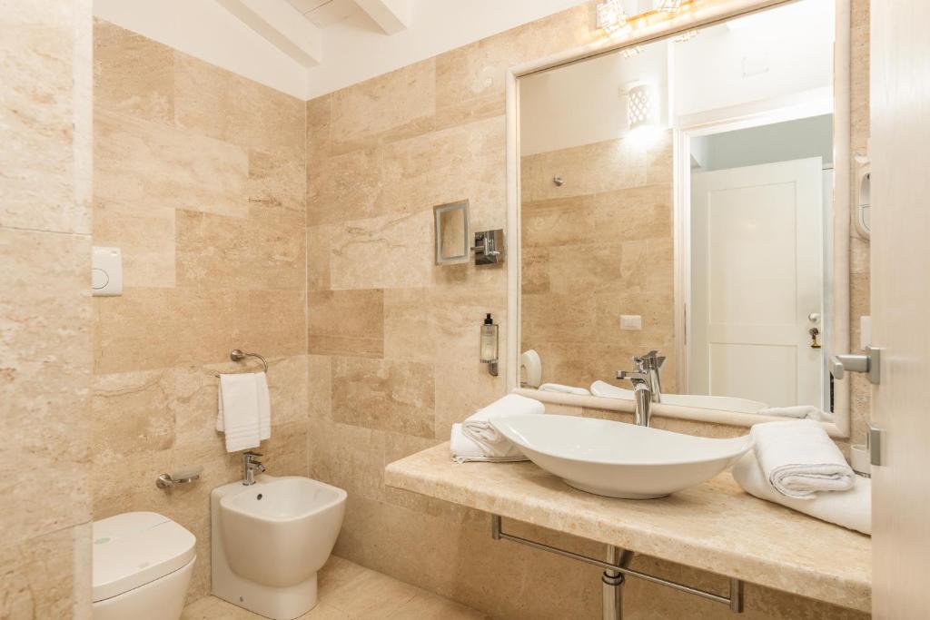 Ванная комната в Hotel Vecchia Marina