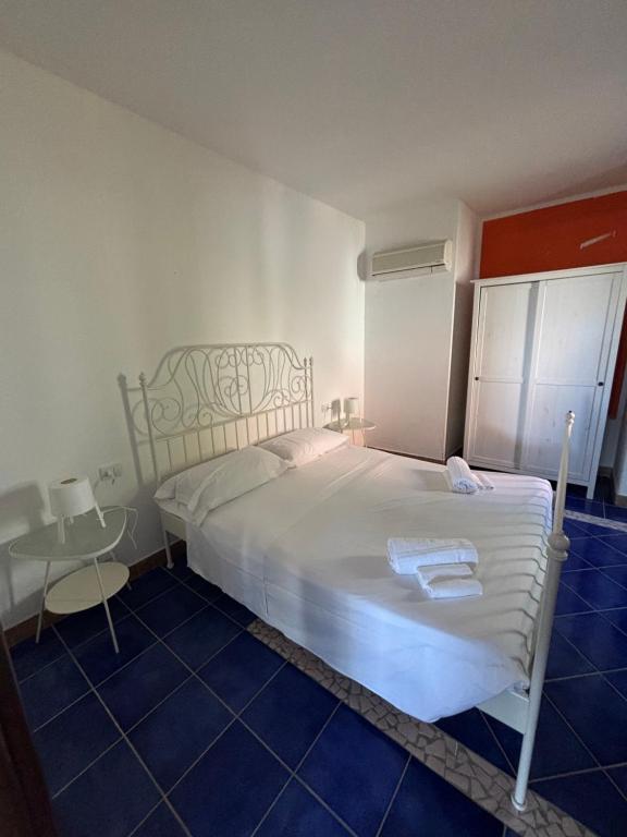 Postel nebo postele na pokoji v ubytování Anima Rooms & Pool