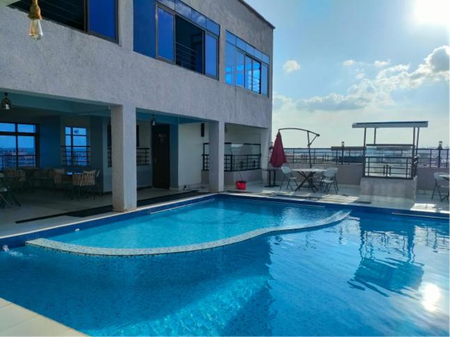 Bazén v ubytování BRIMAK HOTEL nebo v jeho okolí