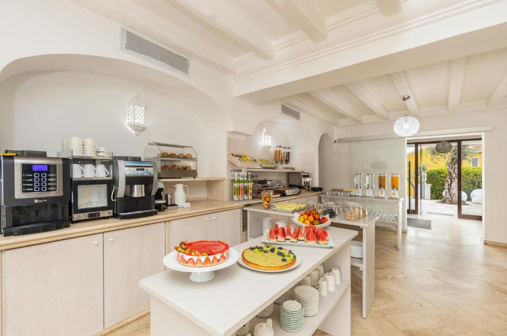 Кухня или мини-кухня в Hotel Vecchia Marina
