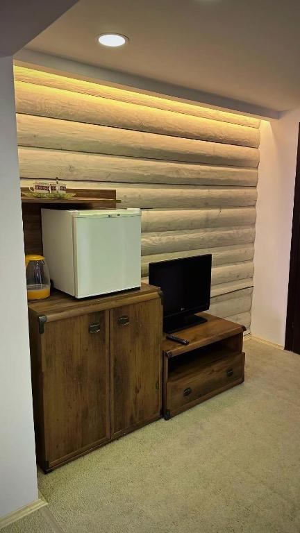 TV a/nebo společenská místnost v ubytování GORGANY resort & SPA