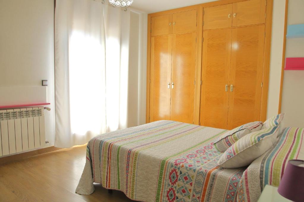 Postel nebo postele na pokoji v ubytování Casa Entre Rosales