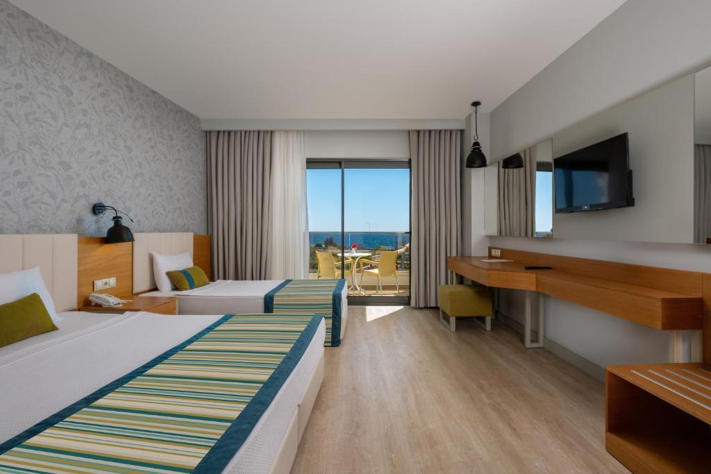 Postel nebo postele na pokoji v ubytování Calido Maris Hotel Ultra All Inclusive