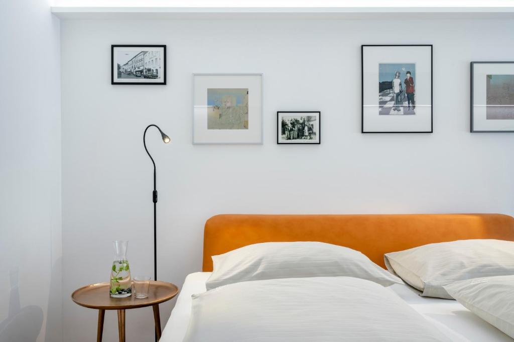 Postel nebo postele na pokoji v ubytování Boutique Hotel Hauser