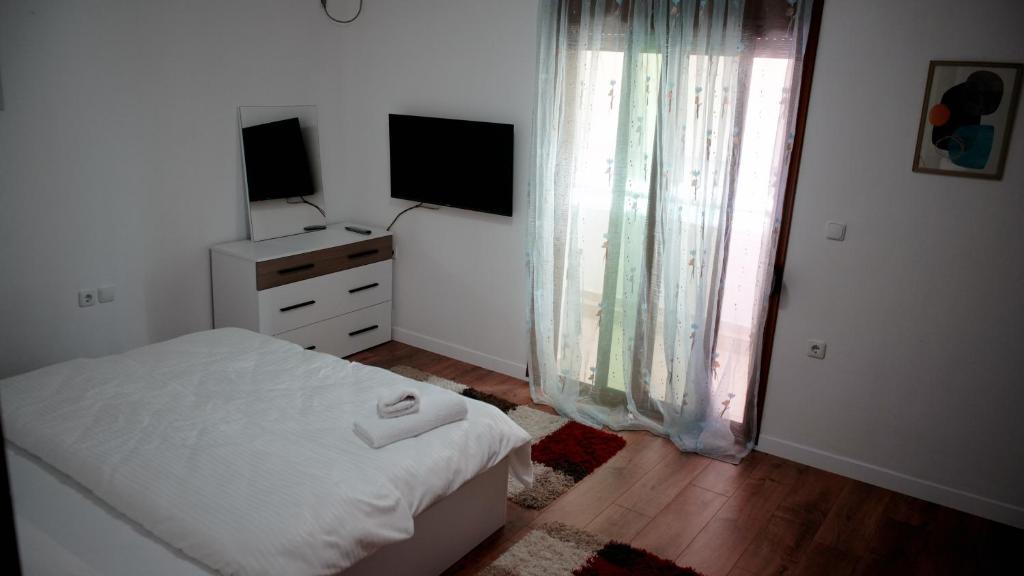 Postel nebo postele na pokoji v ubytování Melek Luxury Apartment Unit 16
