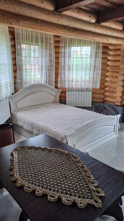 Postel nebo postele na pokoji v ubytování Фазенда "Змерега"