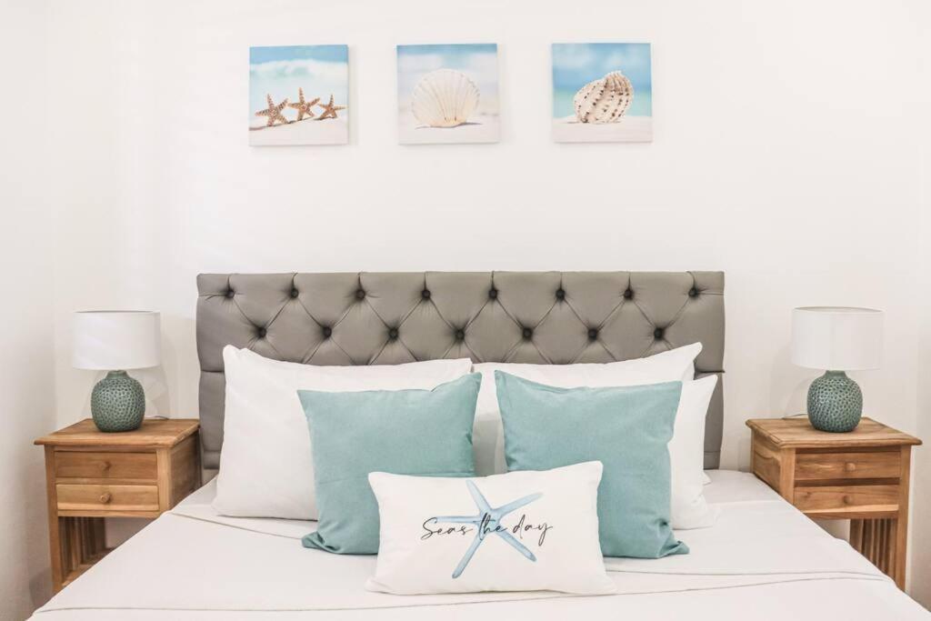 Postel nebo postele na pokoji v ubytování Sapphire Residence