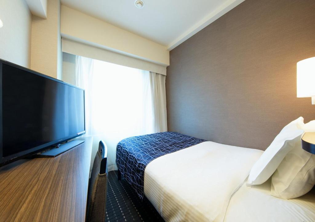 TV a/nebo společenská místnost v ubytování APA Hotel Sakai Ekimae