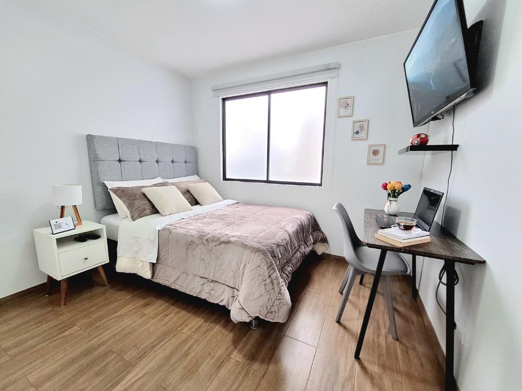 Postel nebo postele na pokoji v ubytování Habitación en departamento Compartido - La Paz 504