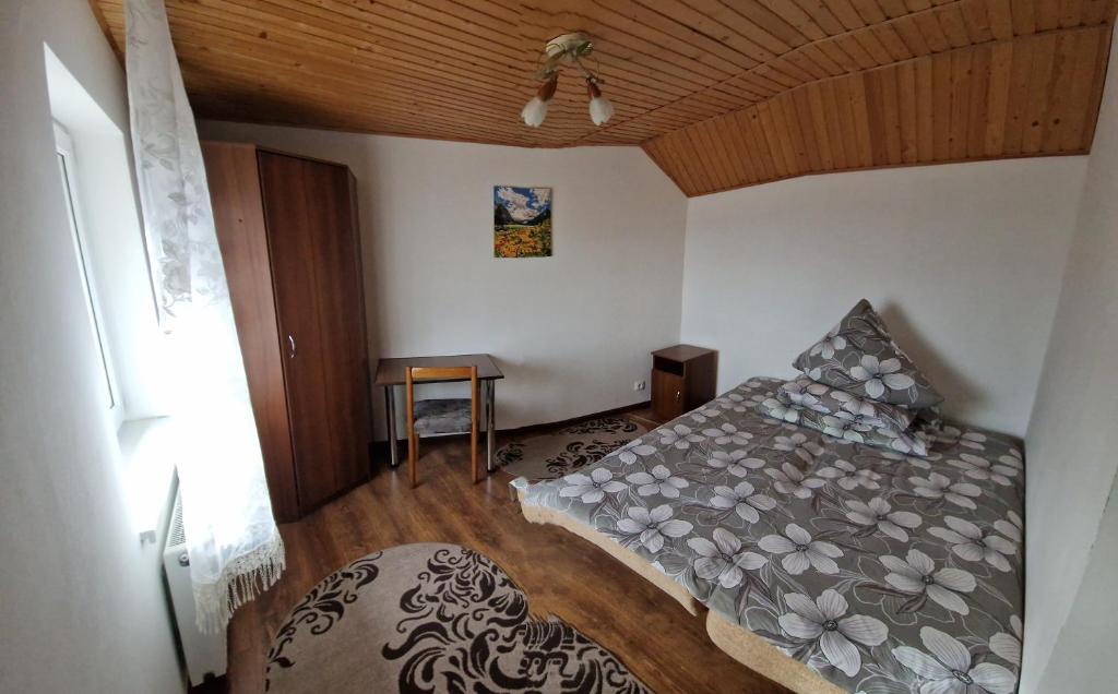 Postel nebo postele na pokoji v ubytování У ДЯДЬКА