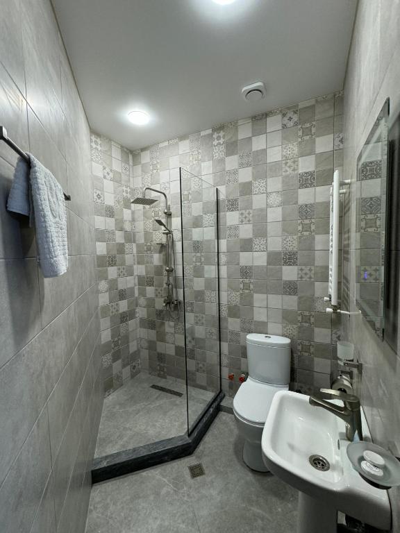 Koupelna v ubytování Hotel Boutique Adam