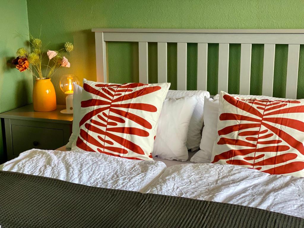 Postel nebo postele na pokoji v ubytování Ferienwohnung Strandhafer