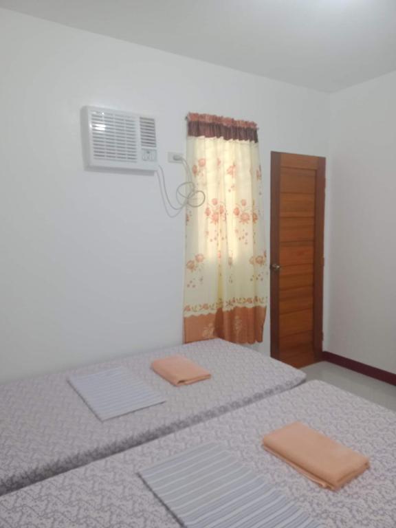 Fotografie z fotogalerie ubytování Felipa Beach and Guesthouse - Newly Renovated Airconditioned Guest Rooms v destinaci Dumaguete