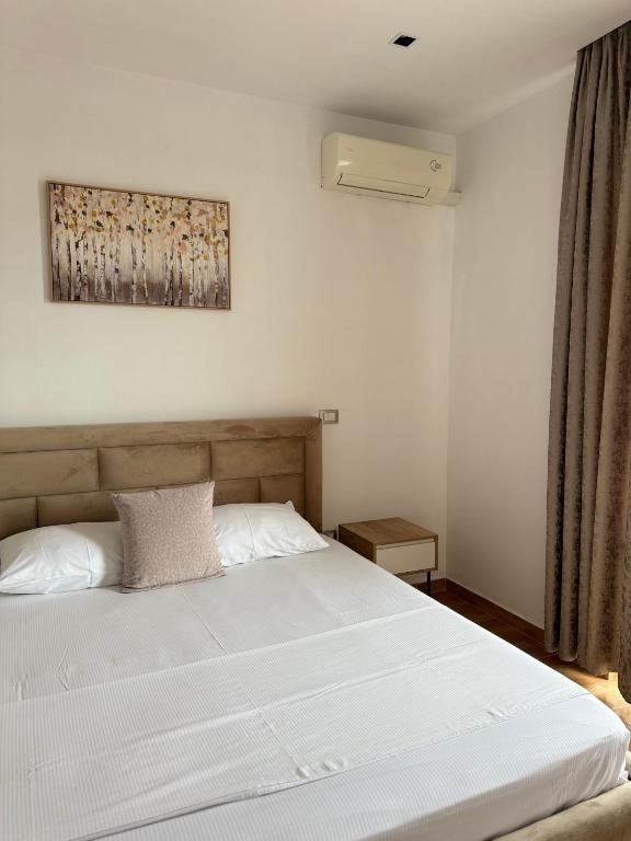 Postel nebo postele na pokoji v ubytování GuestHouse Cami