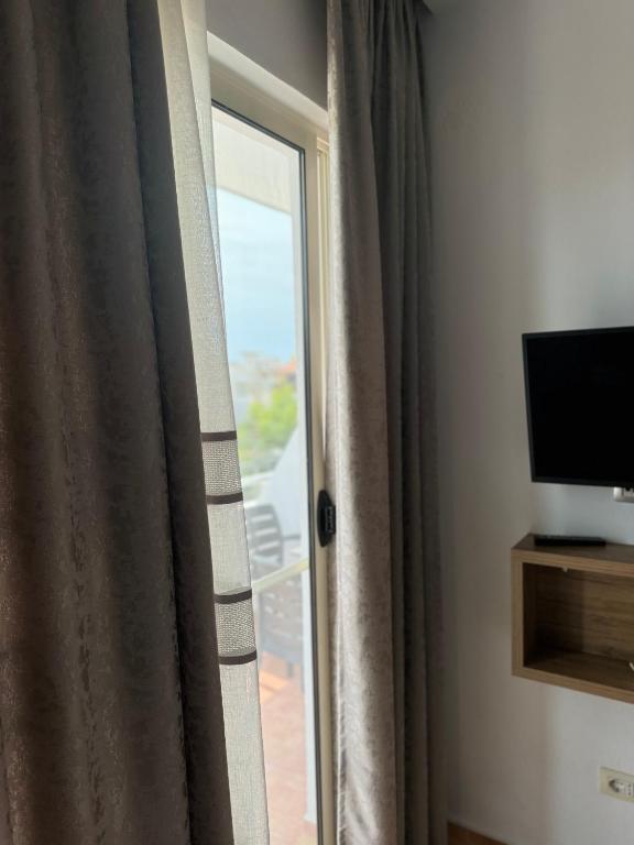 TV a/nebo společenská místnost v ubytování GuestHouse Cami