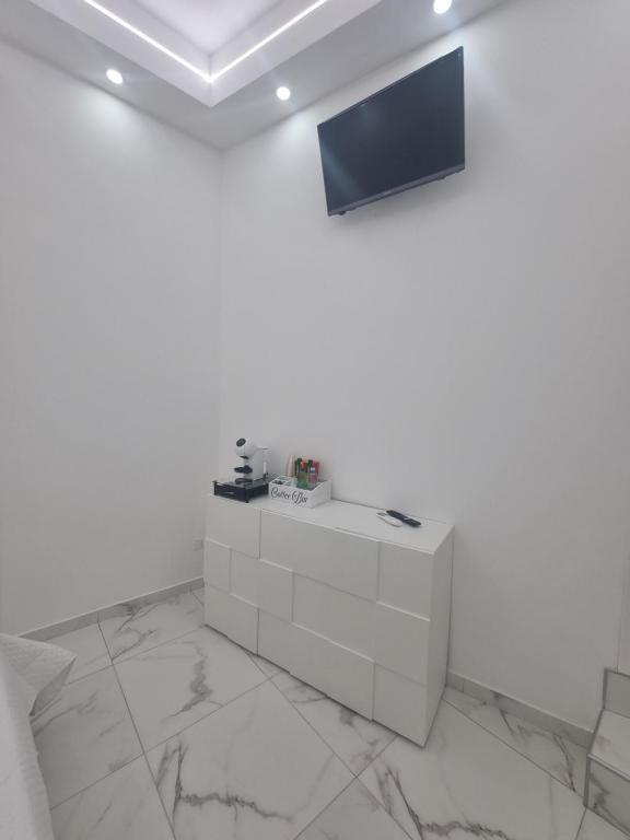 TV a/nebo společenská místnost v ubytování Serenity Suite