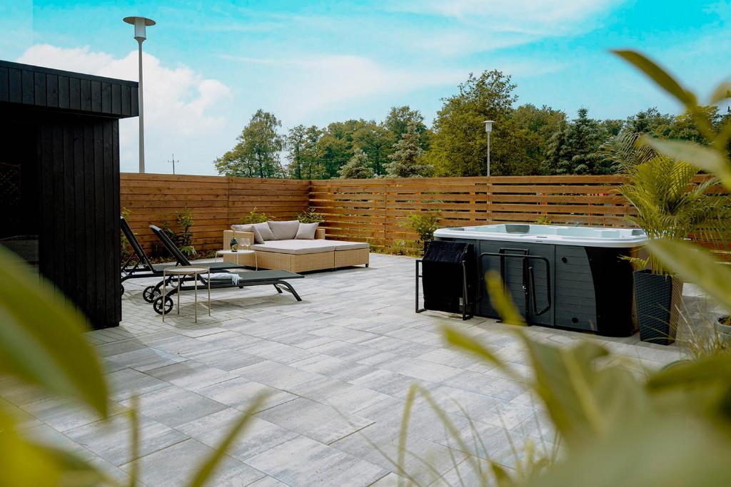 Fotografie z fotogalerie ubytování BED & BIKE Resort Trzęsacz - domki, sauna, jacuzzi & rowery v destinaci Trzęsacz