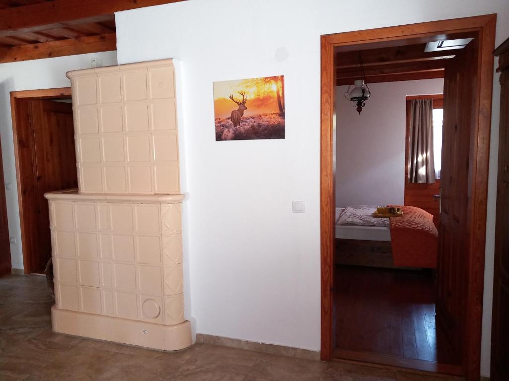 Postel nebo postele na pokoji v ubytování Vadszőlős Porta