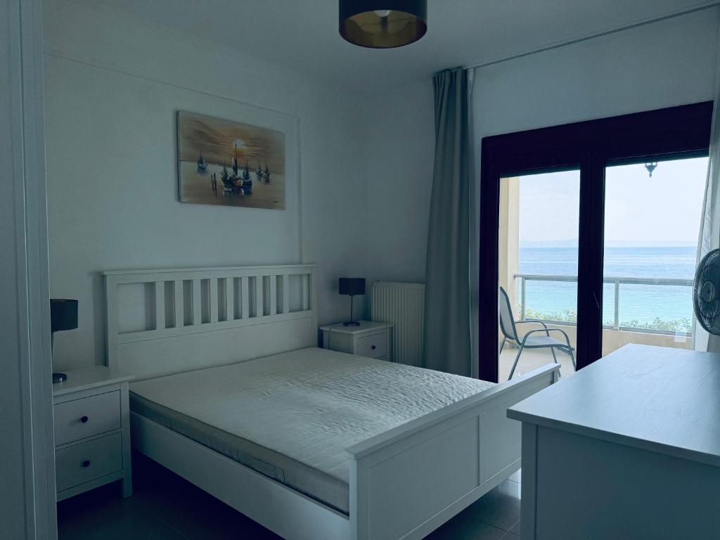 Postel nebo postele na pokoji v ubytování Villa by Athos Cape