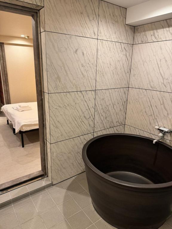 Koupelna v ubytování Hotel Be-zen shimanouchi