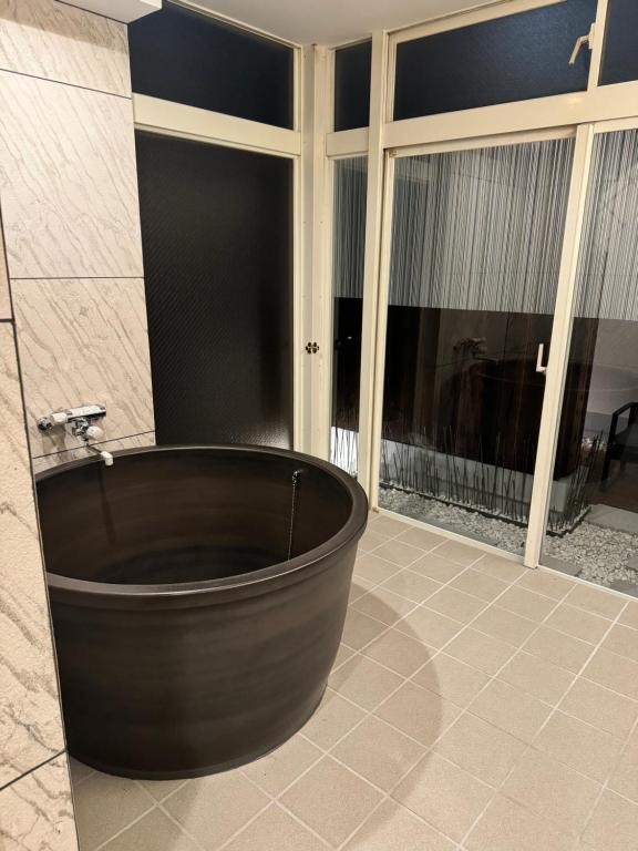 Koupelna v ubytování Hotel Be-zen shimanouchi
