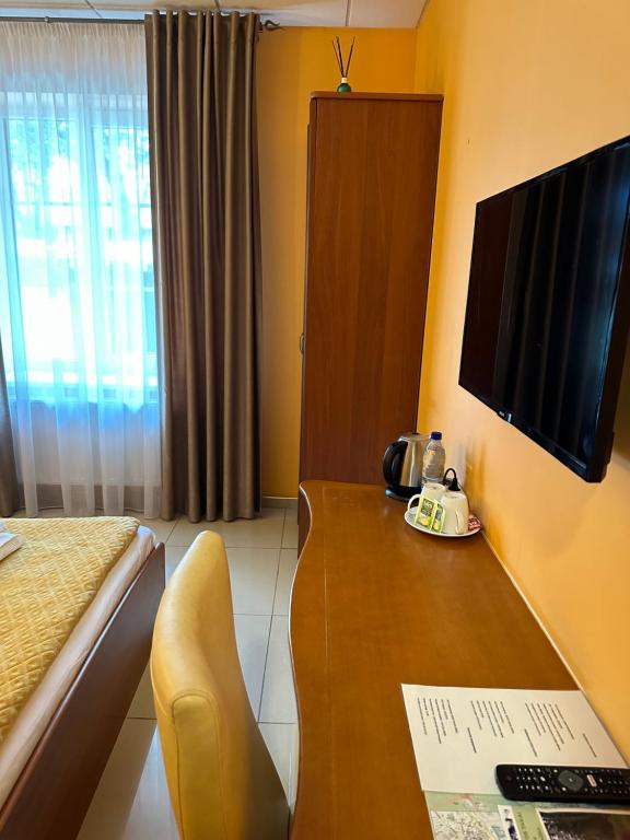 TV a/nebo společenská místnost v ubytování Guest house POILSIS JUMS